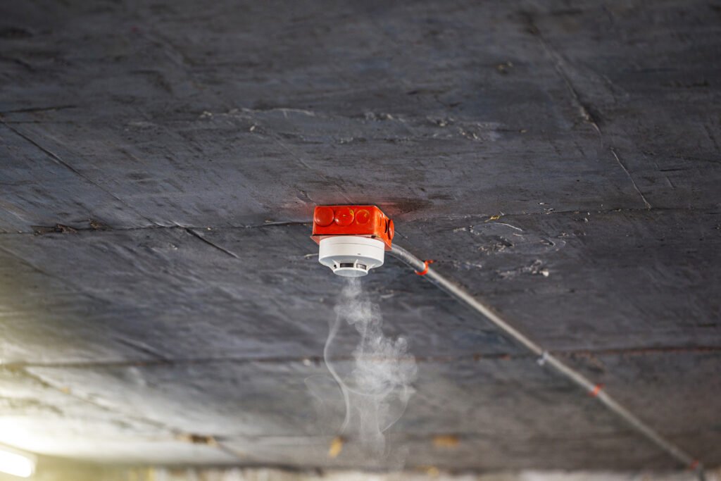 Fire Alarm Installer running Smoke Test